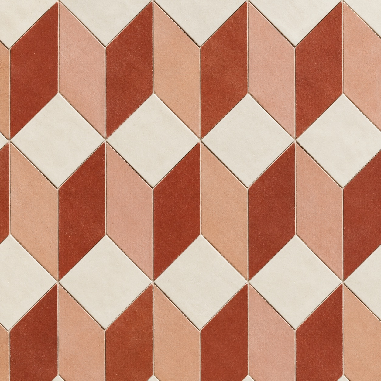 Close-up of terracotta, clay, and ivory geometric tile pattern